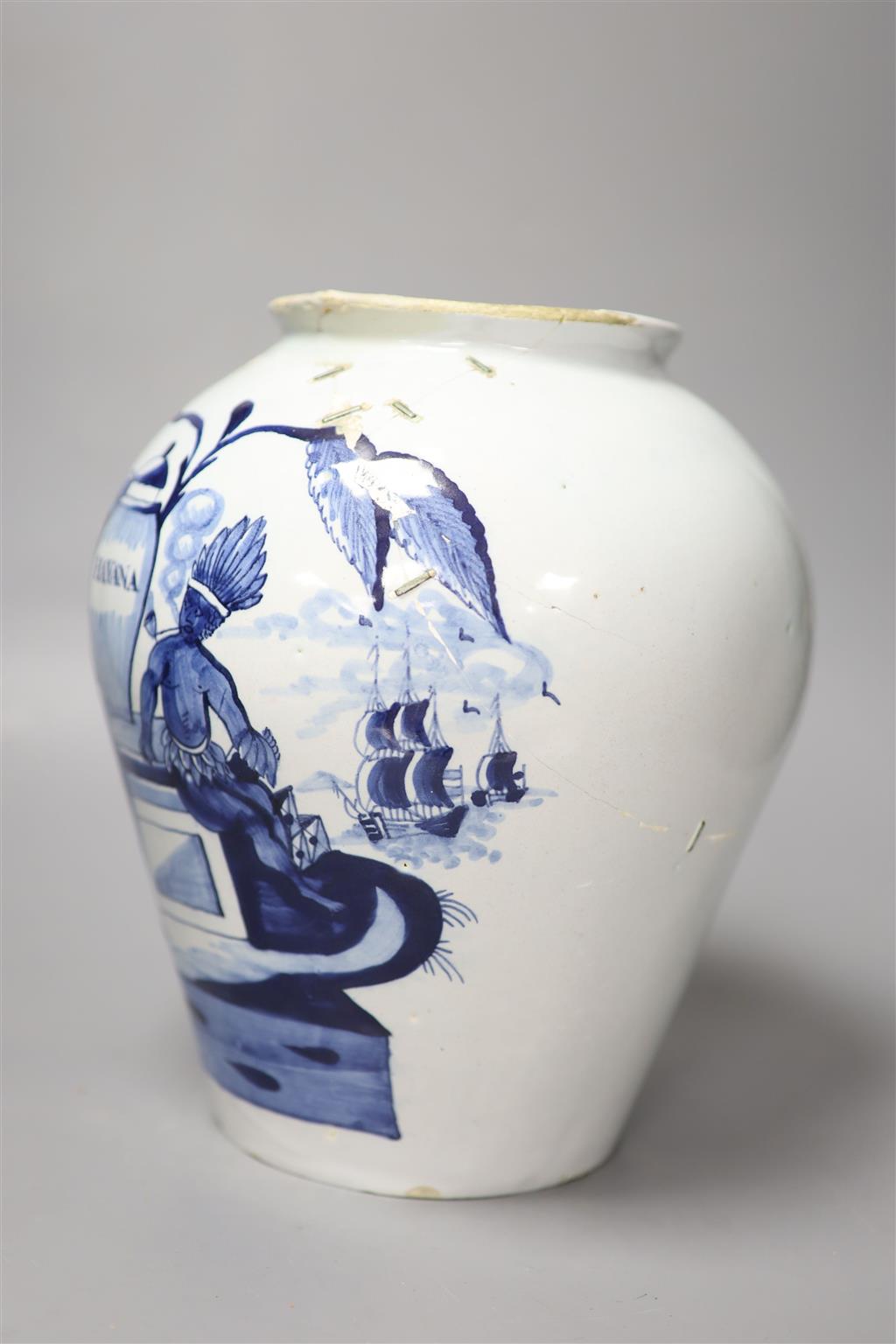 An 18th century Delft Havana tobacco jar, height 26cm (not including cover) (a.f.)